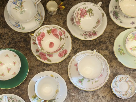 Tea cups and saucers with floral designs