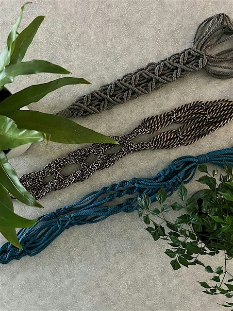 Green and blue macrame rope with plants