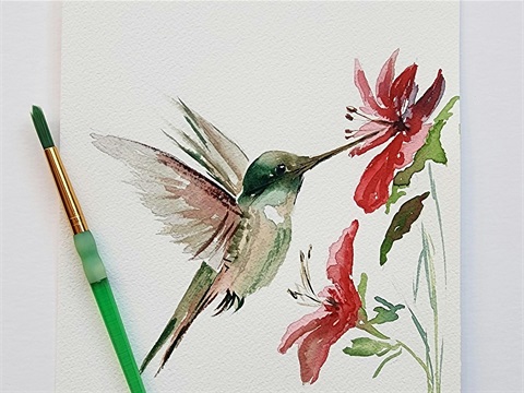 A watercolor painting of a hummingbird and flowers